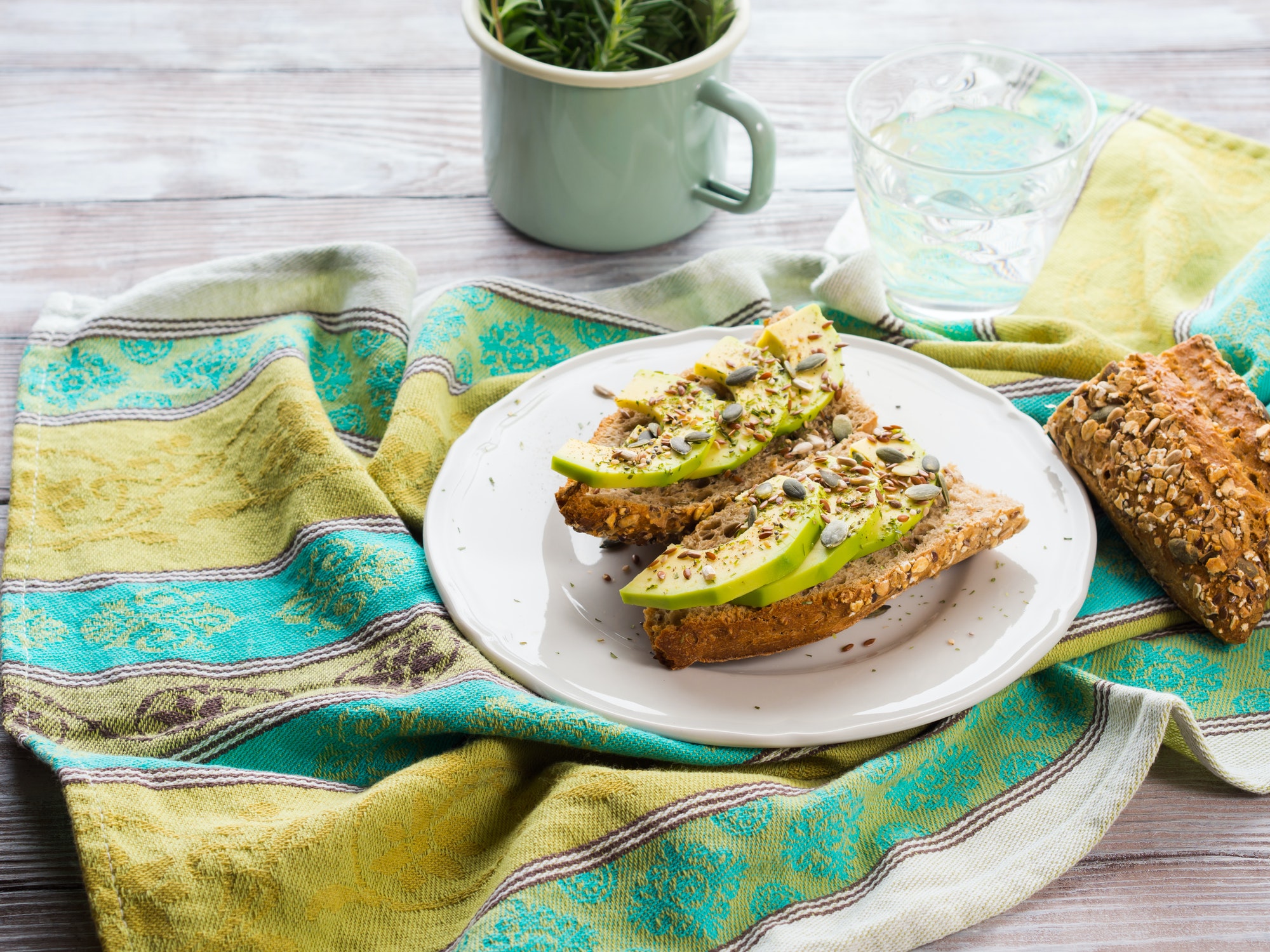 avocado sandwich for healthy snack with seeds