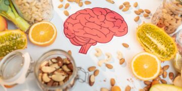 Human brain drawing and healthy fresh food on the table