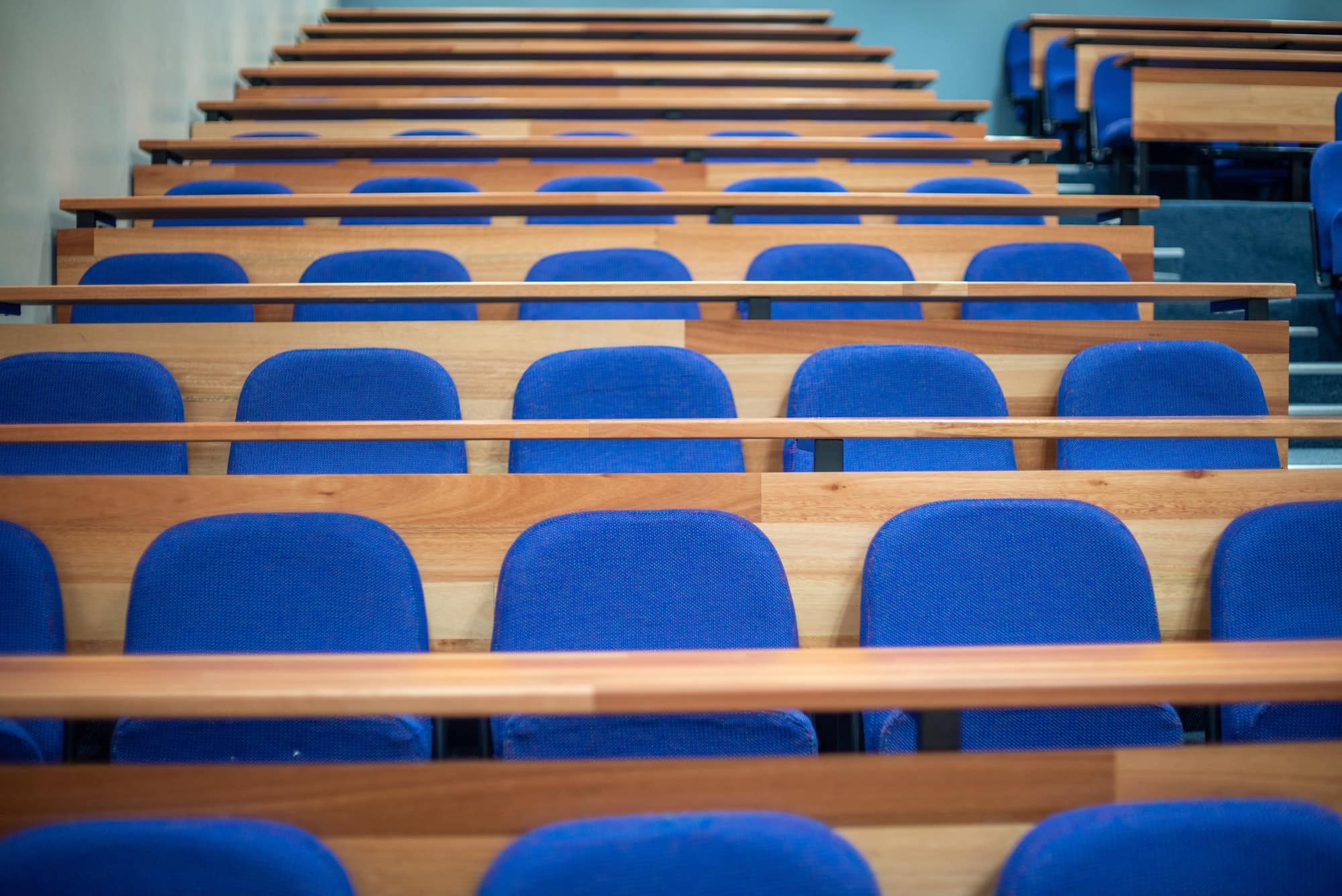 Row of empty seats in classroom