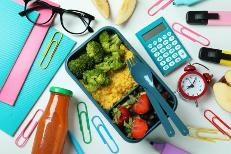 Study concept with lunch box on white background