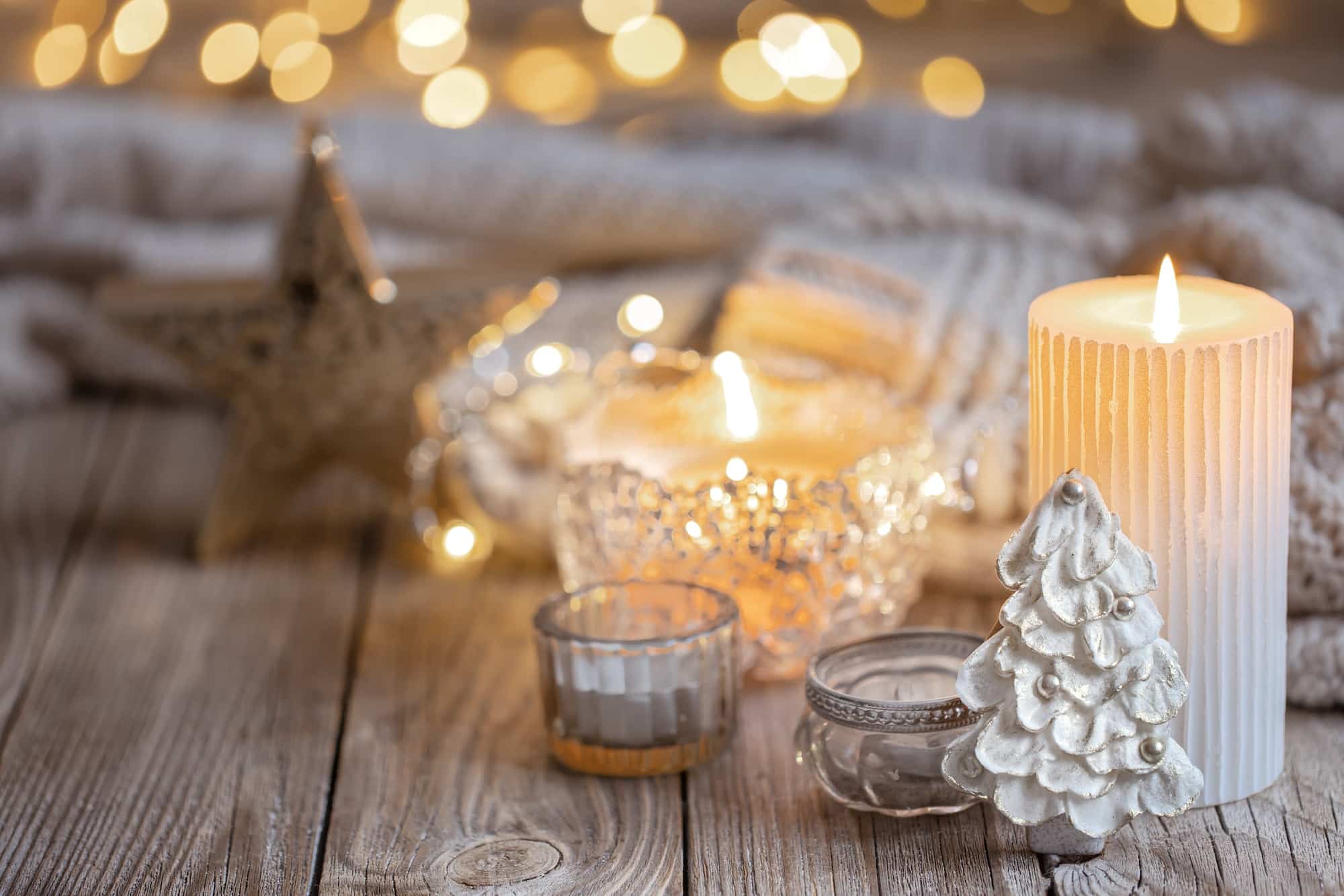 christmas background with burning candle and decor details