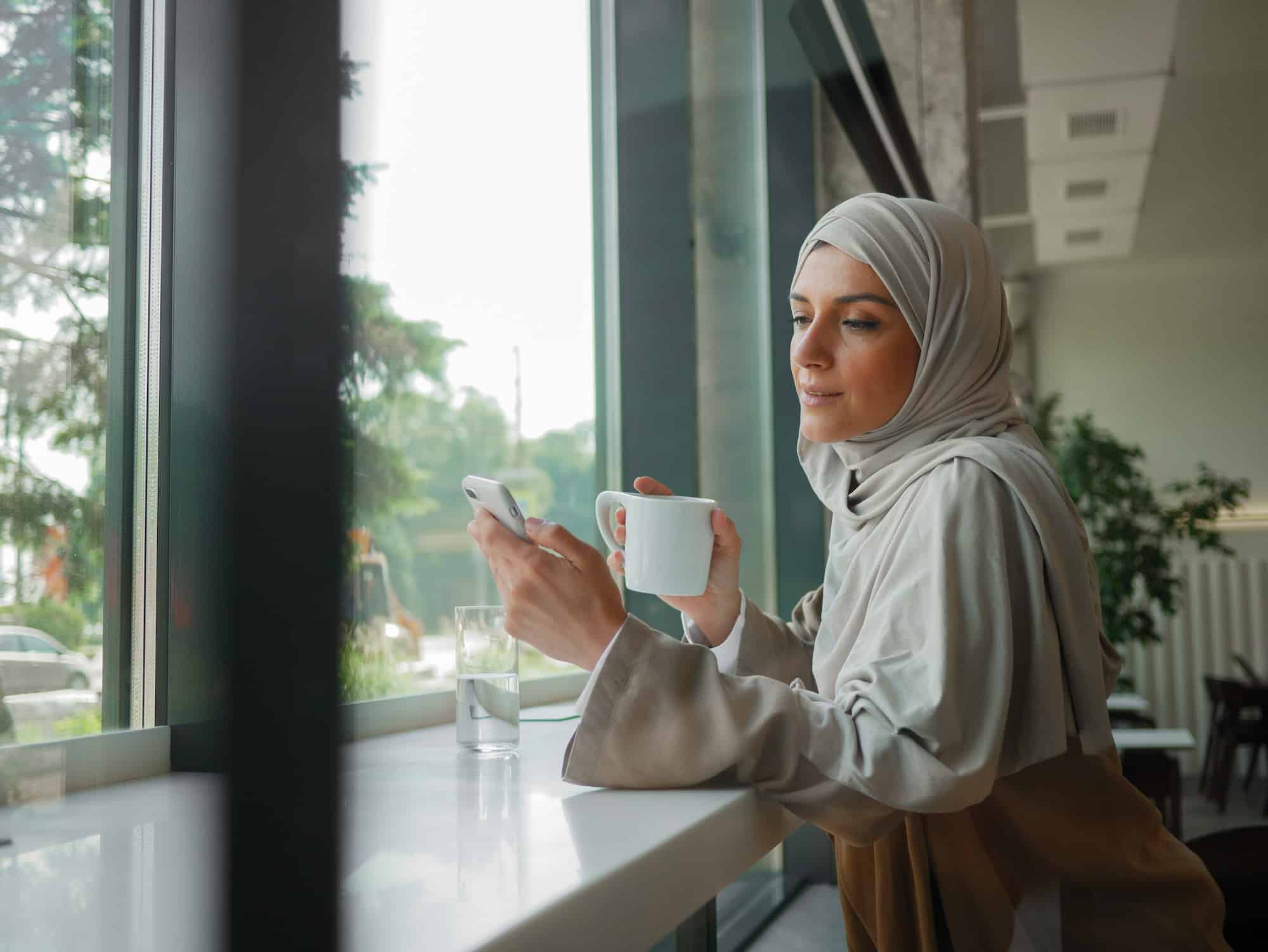 muslim woman on remote working online education or video conversation in caffe