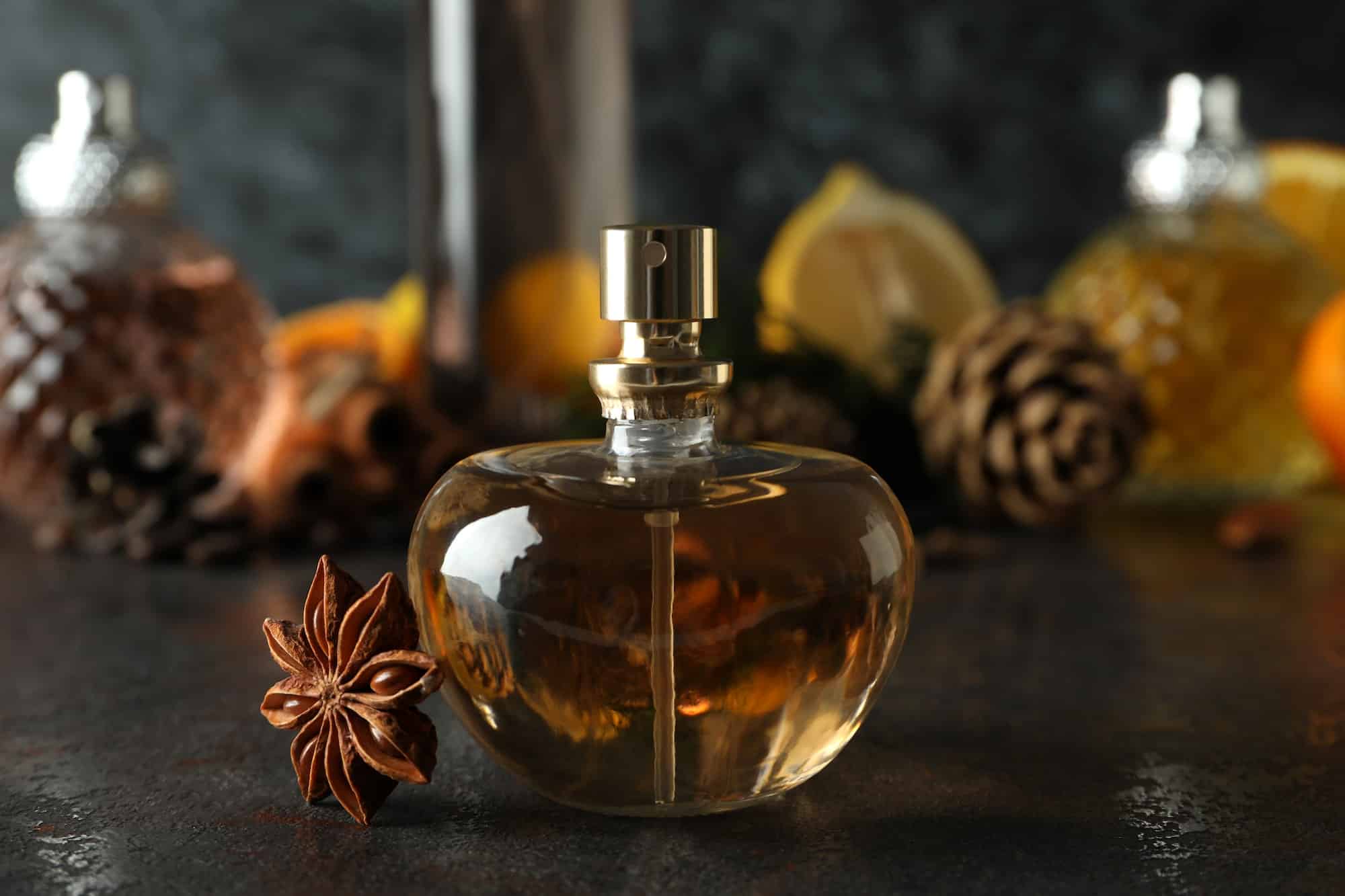 composition with bottle of female perfume close up
