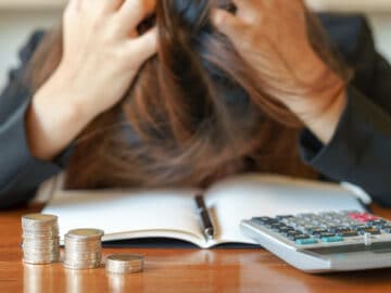 stressed business woman running out money stock market down