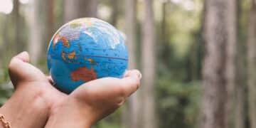 Hand Holding Earth Globe for Earth Day Concept