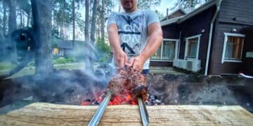 Man grills meat