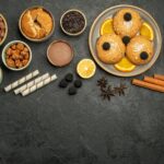 top view different snacks cips cookies flakes and nuts on grey background meal snack breakfast color